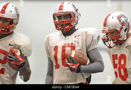 Sept. 12, 2012 - Albuquerque, NM, U.S. - UNM's  #10 Rashad Rainey listens as one of the coaches have them run  through a drill during practice Wed. afternoon. Wednesday, Sept.12, 2012. (Credit Image: © Jim Thompson/Albuquerque Journal/ZUMAPRESS.com) Stock Photo