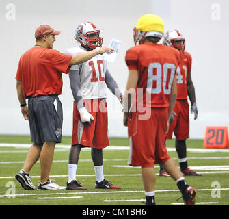 Sept. 12, 2012 - Albuquerque, NM, U.S. - UNM's  #10 Rashad Rainey listens as tight ends coach Derek Warehime talks to him as they run through a play during practice Wed. afternoon. Wednesday, Sept.12, 2012. (Credit Image: © Jim Thompson/Albuquerque Journal/ZUMAPRESS.com) Stock Photo