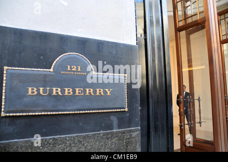 Regent Street, London, UK. 13th September 2012. The main  entrance with a security guard on Regent Street. Burberry opens its new flagship store on Regent Street, the store has four floors and the biggest branch of Burberry in the world. Stock Photo