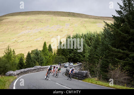 Wales, UK. 14th September 2012. Riders in the breakaway race over a bridge next to the Beacons reservoir on stage 6 of the Tour of Britain Cycle race on Friday, September 14th, 2012. The stage was won by  Leopold Koenig of Team NetApp. Credit:  John Wellings / Alamy Live News Stock Photo