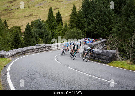 Wales, UK. 14th September 2012. Riders in the main peleton led by Team Sky race over a bridge next to the Beacons reservoir on stage 6 of the Tour of Britain Cycle race on Friday September 14th, 2012. The stage was won by  Leopold Koenig of Team NetApp. Credit:  John Wellings / Alamy Live News Stock Photo