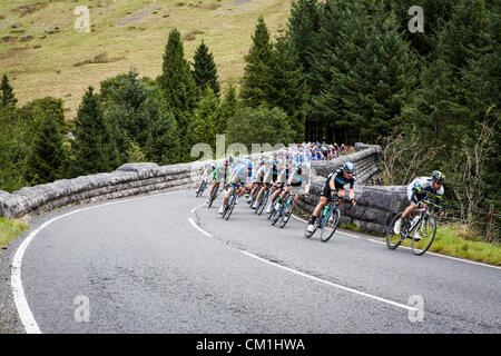 Wales, UK. 14th September 2012. Riders in the main peleton led by Team Sky race over a bridge next to the Beacons reservoir on stage 6 of the Tour of Britain Cycle race on Friday September 14th, 2012. The stage was won by  Leopold Koenig of Team NetApp. Credit:  John Wellings / Alamy Live News Stock Photo