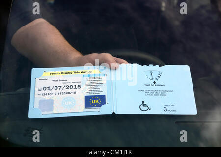 Parking card for disabled people (Disabled person's parking disc a valid blue badge permit) UK Stock Photo