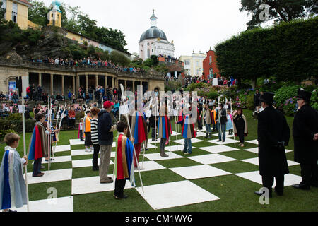Portmerion, Wales, UK.Saturday 15th Sept 2012 A giant human chess game at Festival No6, music, arts,  literature and comedy festival, at Portmeirion italianate village, north wales UK. The iconic village, the pet project of architect Sir Clough Williams-Ellis was the location for the cult 1960's tv programe 'The Prisoner' Stock Photo