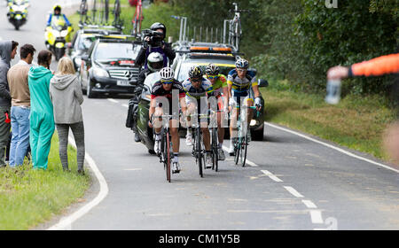 16th September 2012. The final stage of the Tour of Britain passes through the Surrey countryside at Okewood Hill. The breakaway group are approaching a feeding zone. Stock Photo