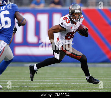 Sept. 16, 2012 - Florida, U.S. - On the Bucs final possession of the game, Tampa Bay Buccaneers wide receiver Vincent Jackson (83) run to the sideline to manage the clock after a 19 yard gain, as New York Giants cornerback Justin Tryon (30) assists. SECOND HALF ACTION: The Tampa Bay Buccaneers play the New York Giants at MetLife Stadium in East Rutherford, N.J. on Sunday. The New York Giants won 41-34. (Credit Image: © Daniel Wallace/Tampa Bay Times/ZUMAPRESS.com) Stock Photo