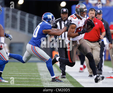 Sept. 16, 2012 - Florida, U.S. - On the Bucs final possession of the game, Tampa Bay Buccaneers wide receiver Vincent Jackson (83) steps out of bounds to manage the clock after a 19 yard gain, as New York Giants cornerback Justin Tryon (30) assists. SECOND HALF ACTION: The Tampa Bay Buccaneers play the New York Giants at MetLife Stadium in East Rutherford, N.J. on Sunday. The New York Giants won 41-34. (Credit Image: © Daniel Wallace/Tampa Bay Times/ZUMAPRESS.com) Stock Photo