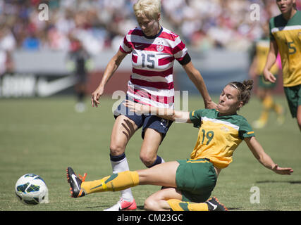 Sept. 16, 2012 - Los Angeles, California (CA, United States - United States' Megan Rapinoe, left, and Australia's Stephanie Catley, right, fight for a ball, during an exhibition soccer match at The Home Depot Center on September 16, 2012 in Carson, California. United States won Australia 2-1. The game is as part of United States women's national team fan tribute tour celebrating the gold medal the team won in London this past Olympiad (Credit Image: © Ringo Chiu/ZUMAPRESS.com) Stock Photo