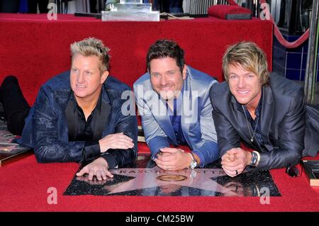 Gary LeVox, Jay DeMarcus, Joe Don Rooney at the induction ceremony for Star on the Hollywood Walk of Fame for Rascal Flatts, Hollywood Boulevard, Los Angeles, CA, USA. September 17, 2012. Stock Photo