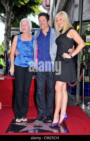 Caron Myers, Jay DeMarcus, Allison Alderson at the induction ceremony for Star on the Hollywood Walk of Fame for Rascal Flatts, Hollywood Boulevard, Los Angeles, CA September 17, 2012. Photo By: Michael Germana/Everett Collection Stock Photo