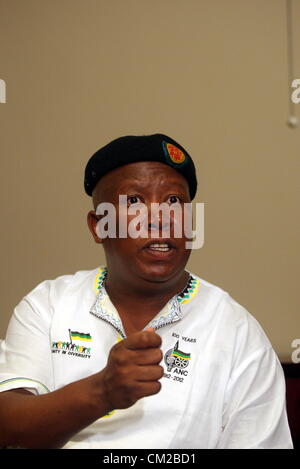 JOHANNESBURG, SOUTH AFRICA: Expelled ANC Youth League leader Julius Malema addresses the media on September 18, 2012 in Johannesburg, South Africa. Malema, who was recently blocked by police from speaking to striking Lonmin mine workers, accused President Jacob Zuma and several Ministers of being behind a plot to have him killed. (Photo by Gallo Images / Sowetan / Veli Nhlapo) Stock Photo