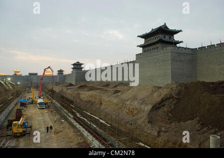 The city centre undergoing major construction works on the old wall. The Mayor of Datong’s regeneration programme aims to distance the area from its recent coal-mining fame, and return the area instead to its past glory and historical significance. © Olli Geibel Stock Photo