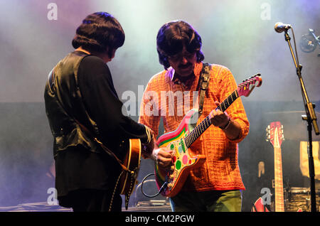 Manel Mateo as Paul McCartney and Ferran Corbalan as George Harrison, members of the Beatles revival band 'Abbey road', live on stage at Barcelona's city festival 'La Merce', 2012, at St Jaume place, in front of the town hall. Stock Photo