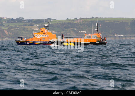 Bangor, County Down. 23/09/2012 - Donaghadee RNLI lifeboat and Belfast Pilot crews scan the sea for survivors and bodies.  Emergency Services hold 'Operation Diamond', a joint training exercise off the coast of North Down. Stock Photo