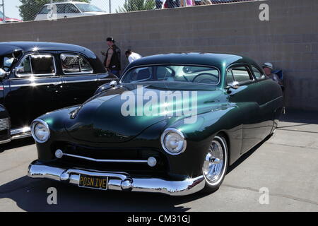 EL MONTE, CALIFORNIA, USA - SEPTEMBER 23, 2012 - A wide variety of rare vintage aircraft and cars on display at the El Monte Airshow on September 23, 2012. Stock Photo