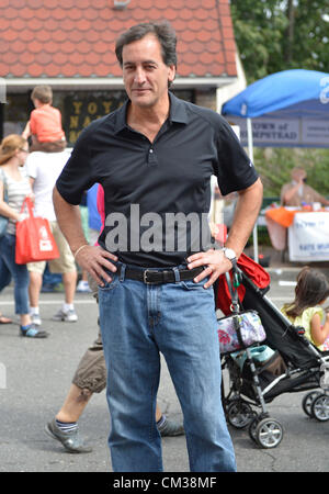 Sept. 22, 2012 - Bellmore, New York U.S. - New York State Senator CHARLES FUSCHILLO (R-Merrick) is at the 26th Annual Bellmore Family Street Festival, where his booth publicized his upcoming community events such as Senior ID Programs. More people than the well over 120,000 who attended the Long Island fair last year were expected. Stock Photo