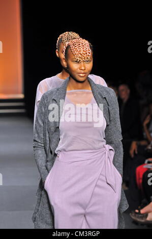 JOHANNESBURG, SOUTH AFRICA - SEPTEMBER 27: Models showcase a design from Black Coffee. In the Autumn/Winter Collections 2013, which is part of SA Fashion week, on September 27, 2012 in Johannesburg, South Africa (Photo by Gallo Images / Dino Lloyd) Stock Photo