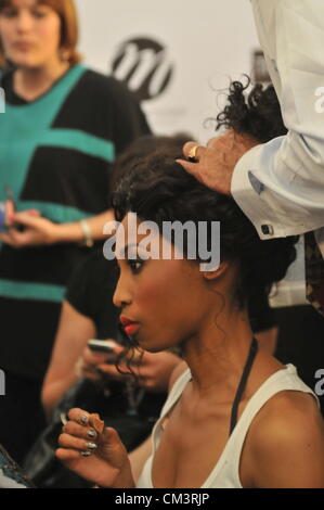 JOHANNESBURG, SOUTH AFRICA - SEPTEMBER 27: A model has her hair styled backstage. During the Autumn/Winter Collections 2013, which is part of SA Fashion week, on September 27, 2012 in Johannesburg, South Africa (Photo by Gallo Images / Dino Lloyd) Stock Photo