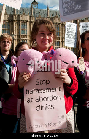 London, UK. 29/09/12. Pro-Choice campaigners holding a rally opposite the Houses of Parliament to highlight the fact that abortion is outlawed in Northern Ireland and that abortion law in the UK is outdated. Around the world 47,000 women will die as a result of unsafe abortions in countries were the procedure is illegal. Stock Photo