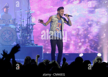 September 28, 2012. Toronto, Canada. Annual youth empowerment event WE DAY, an initiative of Free The Children,  held at Toronto's Air Canada Centre. In picture, Jacob Hoggard of Hedley performs on stage. Stock Photo