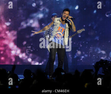 September 28, 2012. Toronto, Canada. Annual youth empowerment event WE DAY, an initiative of Free The Children,  held at Toronto's Air Canada Centre. In picture, Jacob Hoggard of Hedley performs on stage. Stock Photo