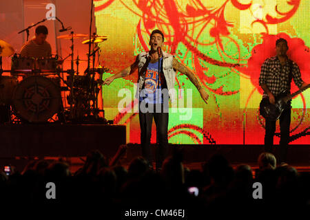 September 28, 2012. Toronto, Canada. Annual youth empowerment event WE DAY, an initiative of Free The Children,  held at Toronto's Air Canada Centre. In picture, Jacob Hoggard of Hedley performs on stage. Stock Photo