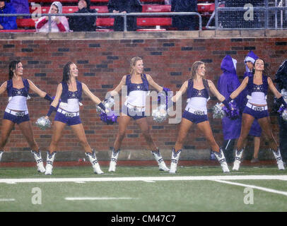 Sept. 29, 2012 - Dallas, Texas, United States of America - TCU Horned Frogs cheerleaders in action during heavy rainfall in the game between the Southern Methodist Mustangs and the TCU Horned Frogs at the Gerald J. Ford Stadium in Dallas, Texas. TCU defeats SMU 24 to 16. (Credit Image: © Dan Wozniak/ZUMAPRESS.com) Stock Photo