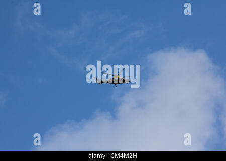 Machynlleth, Wales, UK. 3 October 2012. A police helicopter circles the Dyfi River just to the north of Pont-ar-Ddyfi, searching for the abducted little girl, April Jones. Credit:  atgof.co / Alamy Live News Stock Photo