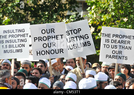Westminster, London, UK. 6th October 2012. A large crowd hold banners and listen to speakers. A protest outside Parliament in Westminster against the film 'Innocence of Muslims', arranged to demonstrate about the film which is seen as offensive about the Prophet Mohammed. Credit:  Matthew Chattle / Alamy Live News
