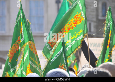 Westminster, London, UK. 6th October 2012. Flags at the protest near Parliament. A protest outside Parliament in Westminster against the film 'Innocence of Muslims', arranged to demonstrate about the film which is seen as offensive about the Prophet Mohammed. Credit:  Matthew Chattle / Alamy Live News
