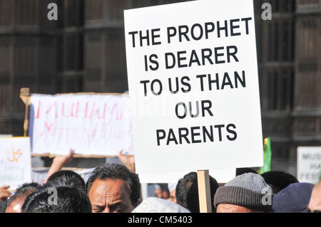 Westminster, London, UK. 6th October 2012. A large crowd hold banners and listen to speakers. A protest outside Parliament in Westminster against the film 'Innocence of Muslims', arranged to demonstrate about the film which is seen as offensive about the Prophet Mohammed. Credit:  Matthew Chattle / Alamy Live News