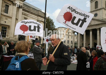 London, UK, 7th October 2012. Protesters against the war in Afghanistan holding  placards with the slogan 'Afghanistan OUT'.      Credit:  Mario Mitsis / Alamy Live News Stock Photo