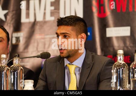 London, UK. 9th October 2012. Boxer Amir Khan speaks at the Mayfair Hotel in London on Tuesday October 9, 2012 to promote his December 15 bout against Carlos Molina in Los Angeles.  Credit:  Paul McCabe / Alamy Live News Stock Photo