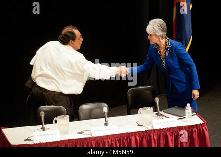 Oct. 9, 2012 - Tucson, Arizona, U.S - Rep. RAUL GRIJALVA (D-Ariz.), the Democratic candidate in Arizona's CD3 race and GABRIELA SAUCEDO-MERCER, the GOP candidate, shake hands after a candidate forum at Pima Community College West Campus in Tucson, Ariz.  Immigration, border policy and Grijalva's 2010 call for a state boycott following the passage of SB1070 were frequent topics of discussion. (Credit Image: © Will Seberger/ZUMAPRESS.com) Stock Photo