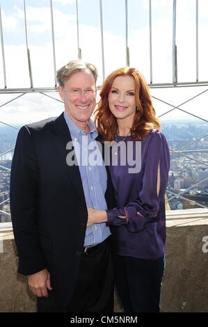 Oct. 10, 2012 - Manhattan, New York, U.S. - Actress MARCIA CROSS, with husband TOM MAHONEY, lights and tours the Empire State Building in honor of Plan International Day of the Girl, a day adopted by the United Nations to recognize girls' rights and the unique challenges girls around the world face, October 10, 2012. (Credit Image: © Bryan Smith/ZUMAPRESS.com) Stock Photo