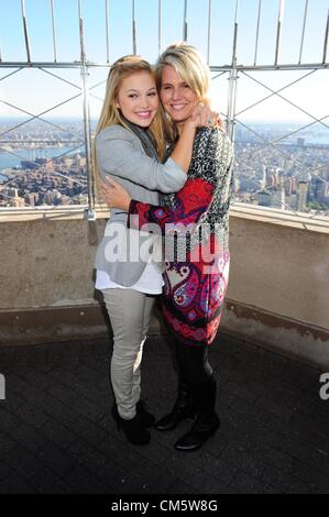 Oct. 11, 2012 - Manhattan, New York, U.S. - OLIVIA HOLT, with her mom KIM HOLT, best known for her starring role in Disney XD's ''Kickin' It'', tours the Empire State Building's 86th floor Observatory October 11, 2012, to promote the upcoming Disney Channel Original Movie, Girl vs. Monster. Olivia stars as 'Skylar' in the Halloween-themed original movie about a teenage girl who discovers the family secret that she is a fifth generation monster hunter. (Credit Image: © Bryan Smith/ZUMAPRESS.com) Stock Photo