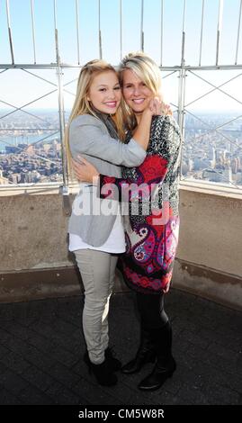 Oct. 11, 2012 - Manhattan, New York, U.S. - OLIVIA HOLT, with her mom KIM HOLT, best known for her starring role in Disney XD's ''Kickin' It'', tours the Empire State Building's 86th floor Observatory October 11, 2012, to promote the upcoming Disney Channel Original Movie, Girl vs. Monster. Olivia stars as 'Skylar' in the Halloween-themed original movie about a teenage girl who discovers the family secret that she is a fifth generation monster hunter. (Credit Image: © Bryan Smith/ZUMAPRESS.com) Stock Photo