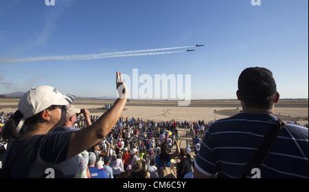 Oct. 14, 2012 - Los Angeles, California (CA, United States - Spectators are watching the U.S. Navy Blue Angeles as they perform during the Miramar Air Show in San Diego, California on Octpber 14, 2012. The Miramar Air Show is an annual air show held at Marine Corps Air Station Miramar. The three-day event is the largest military air show in the nation. This year's theme is ''Marines in Flight: Celebrating 50 Years of Space Exploration' (Credit Image: © Ringo Chiu/ZUMAPRESS.com) Stock Photo