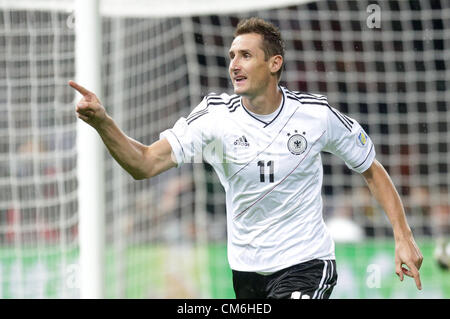 16.10.2012. Berlin, Germany.  Germany's Miroslav Klose celebrates after scoring the first goal during the FIFA World Cup 2014 qualifying soccer match between Germany and Sweden at Olympic stadium in Berlin, Germany, 16 October 2012. Credit:  Action Plus Sports Images / Alamy Live News Stock Photo