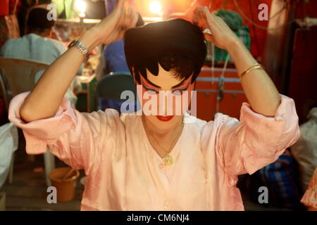 Oct. 17, 2012 . Bangkok . Thailand . Performer prepares make up , Back stage with Chinese opera performers at a Chinese god shrine in Thailand's vegetation festival 2012, celebrated from the 14th to 24th October 2012. Credit:  John Vincent / Alamy Live News Stock Photo