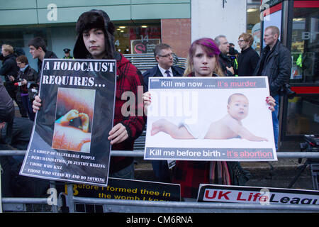 Belfast, UK. 18th October, 2012. protesters holding an anti-abortion banner at the opening of the new Marie Stopes clinic in Belfast, the first private clinic in Northern ireland to offer abortions. The clinic, which opened today, offers abortions under the law in Northern Ireland. Stock Photo