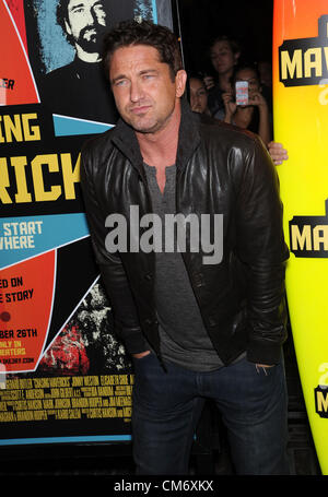 Oct. 18, 2012 - Los Angeles, California, U.S. - Gerard Butler arrives for the premiere of the film 'Chasing Mavericks' at the Pacific Theatres at The Grove. (Credit Image: © Lisa O'Connor/ZUMAPRESS.com) Stock Photo