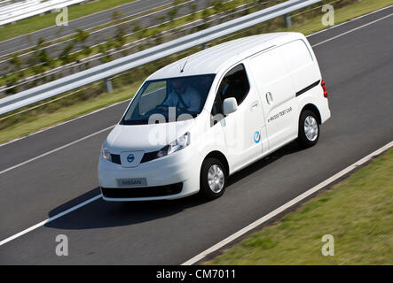 Photo shows a prototype of Nissan's e-NV200 electric vehicle during a test run at the automaker's Oppama test circuit in Yokohama, Japan on 17 Oct. 2012.  Photographer: Robert Gilhooly Stock Photo