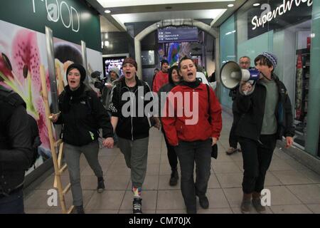 London, UK. 19th October 2012 A demonstration organised by the Traveller Solidarity Network targeted Eric Pickles Department for Communities and Local Government. Some protestors climbed onto the entrance of the building while others struggled with police. Stock Photo