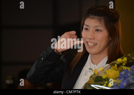 October 23, 2012, Tokyo, Japan - Saori Yoshida, Japan's three-time Olympic wrestling champion, poses for photographers following a news conference in Tokyo on Tuesday, October 23, 2012. Japanese government decided to bestow the People's Honor Award on her for 'bringing hope and courage to society.' Yoshida,30, won a total of 13 Olympic and world titles in women's wrestling.  (Photo by Natsuki Sakai/AFLO) AYF -mis- Stock Photo