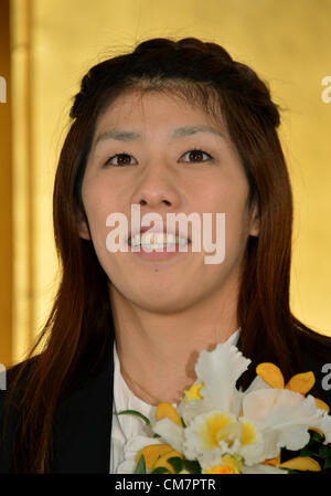 October 23, 2012, Tokyo, Japan - Saori Yoshida, Japan's three-time Olympic wrestling champion, beams a broad smile as she answers questions during a news conference in Tokyo on Tuesday, October 23, 2012, after Japanese government decided to bestow the People's Honor Award on her for 'bringing hope and courage to society.' Yoshida,30, won a total of 13 Olympic and world titles in women's wrestling.  (Photo by Natsuki Sakai/AFLO) AYF -mis- Stock Photo