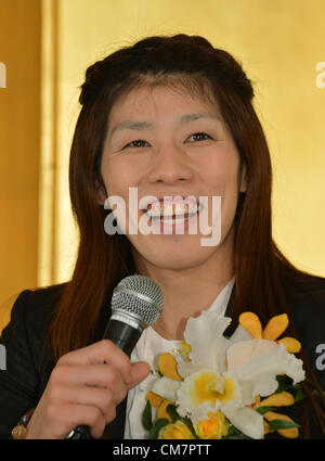 October 23, 2012, Tokyo, Japan - Saori Yoshida, Japan's three-time Olympic wrestling champion, beams a broad smile as she answers questions during a news conference in Tokyo on Tuesday, October 23, 2012, after Japanese government decided to bestow the People's Honor Award on her for 'bringing hope and courage to society.' Yoshida,30, won a total of 13 Olympic and world titles in women's wrestling.  (Photo by Natsuki Sakai/AFLO) AYF -mis- Stock Photo