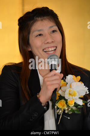 October 23, 2012, Tokyo, Japan - Saori Yoshida, Japan's three-time Olympic wrestling champion, beams a broad smile as she answers questions during a news conference in Tokyo on Tuesday, October 23, 2012, after Japanese government decided to bestow the People's Honor Award on her for 'bringing hope and courage to society.' Yoshida,30, won a total of 13 Olympic and world titles in women's wrestling.  (Photo by Natsuki Sakai/AFLO) AYF -mis- Stock Photo