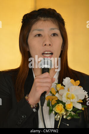 October 23, 2012, Tokyo, Japan - Saori Yoshida, Japan's three-time Olympic wrestling champion, beams a broad smile as she answers questions during a news conference in Tokyo on Tuesday, October 23, 2012, after Japanese government decided to bestow the People's Honor Award on her for 'bringing hope and courage to society.' Yoshida,30, won a total of 13 Olympic and world titles in women's wrestling.  (Photo by Natsuki Sakai/AFLO) AYF -mis- Stock Photo