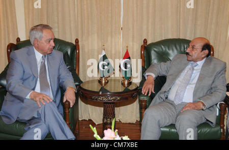 Sindh Chief Minister, Syed Qaim Ali Shah exchanges views with National Accountability Bureau (NAB) Chairman, Admiral (Redt) Fasih Bukhari during meeting at CM House in Karachi on Wednesday, October 24, 2012. Stock Photo